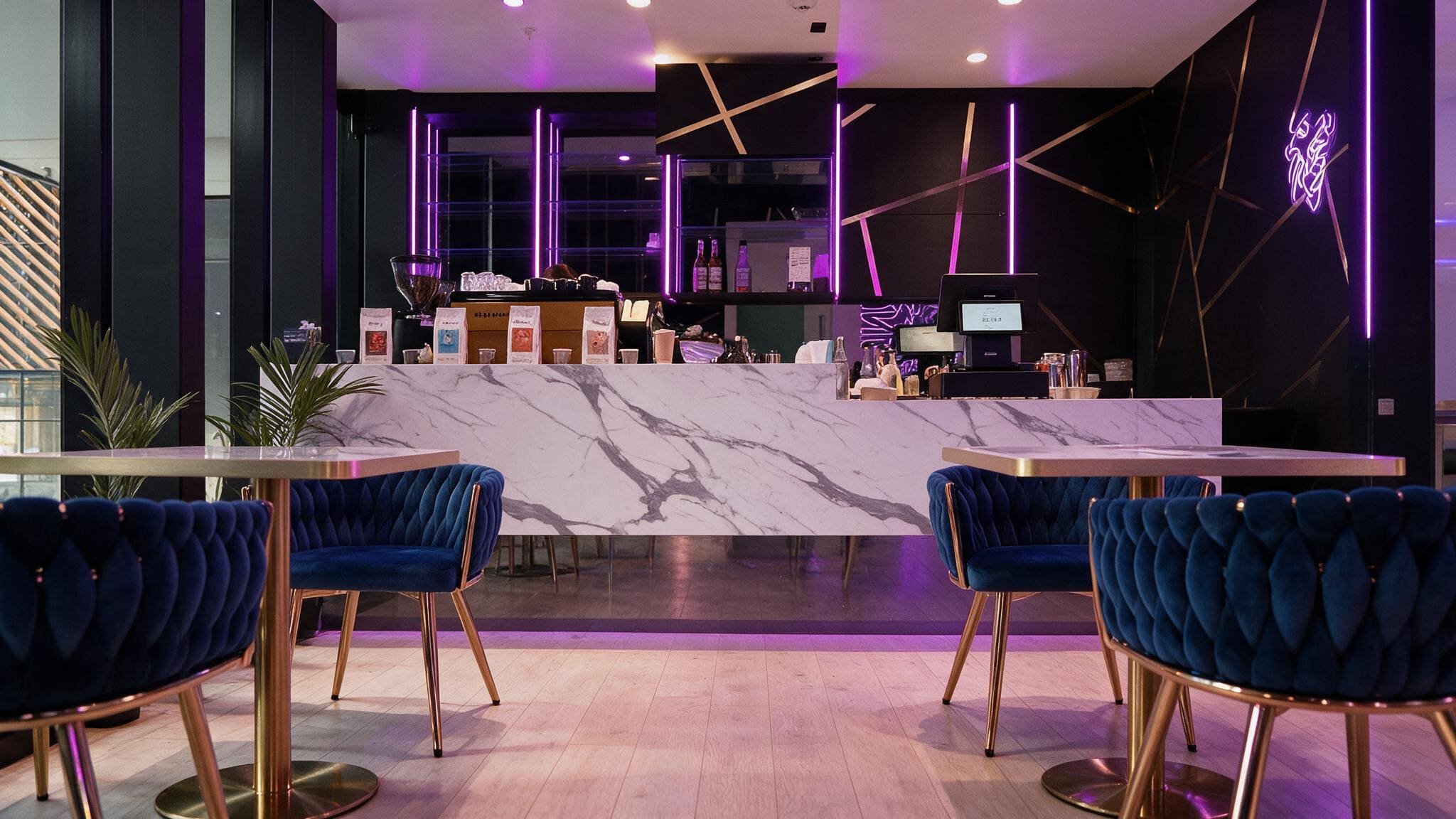 Inside Drunken Tiger: a marble counter, blue velvet chairs and purple neon lighting